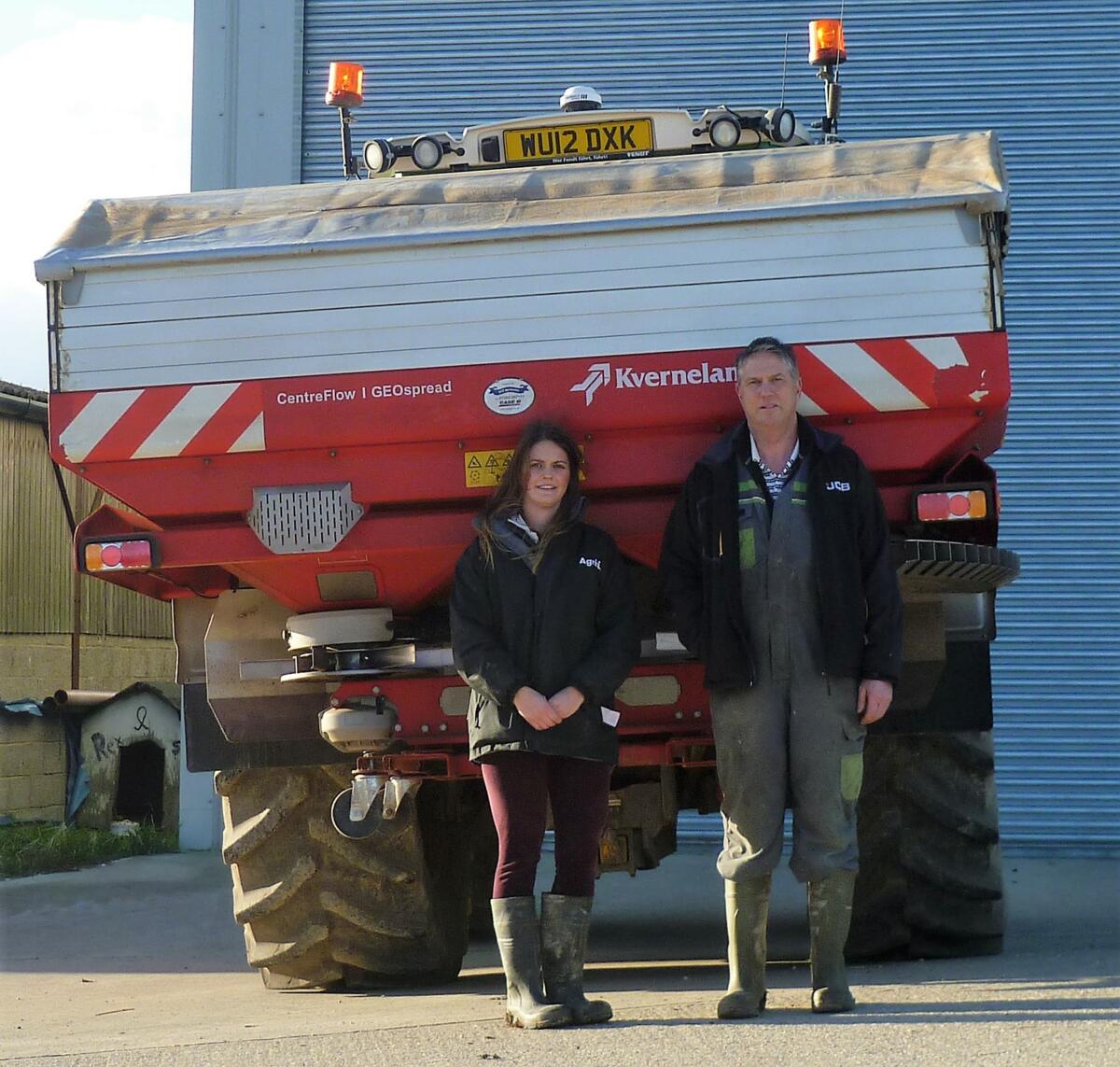 Emma and father with machine